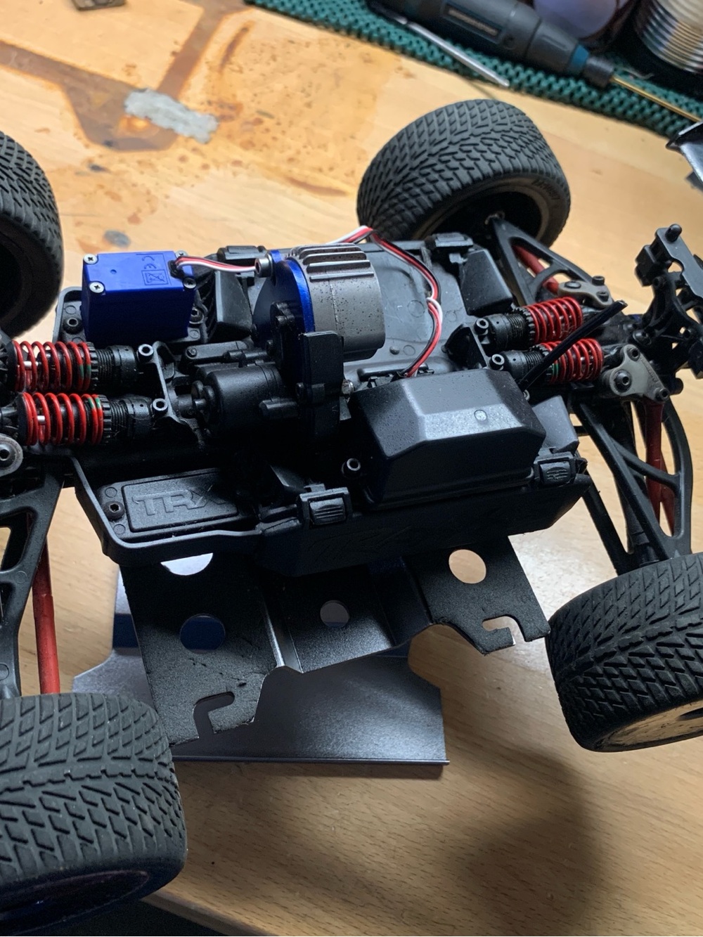 Traxxas RC Chassis with Red Coil Springs and Blue Servo